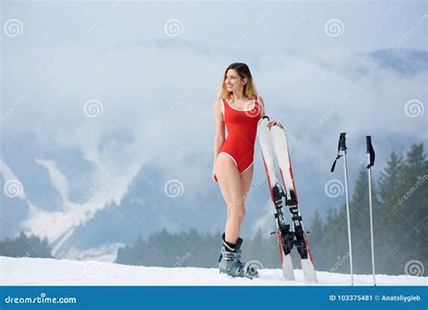 Woman Skier With Skis On Snowy Slope At Winter Ski Resort Stock Image Image Of Extreme Active