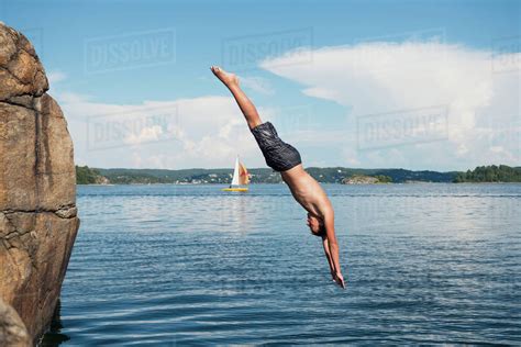 Man Jumping Into Water