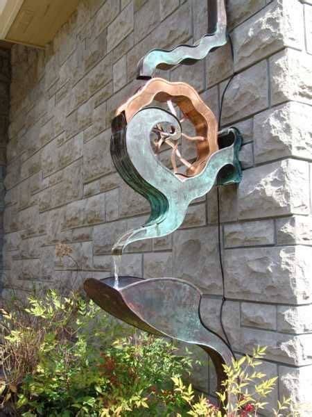 Creative Downspouts Are Excellent House Exterior Decorations That Make