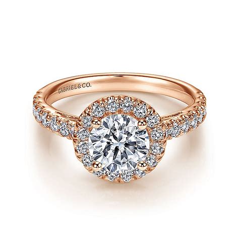 Rose gold sets off a ring with exquisite beauty. 14K Rose Gold Round Halo Diamond Engagement Ring | ER8270K44JJ