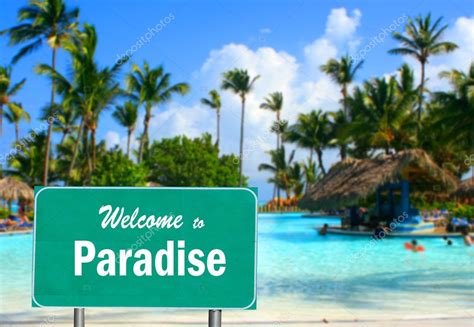 Welcome To Paradise Sign — Stock Photo © Gvictoria 5490358