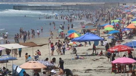 Miles de turistas abarrotan playas de Tijuana el primer día de