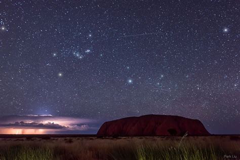 Lightning And Orion Beyond Uluru Astronomy Daily Picture For May 11 2021 Daily Picture