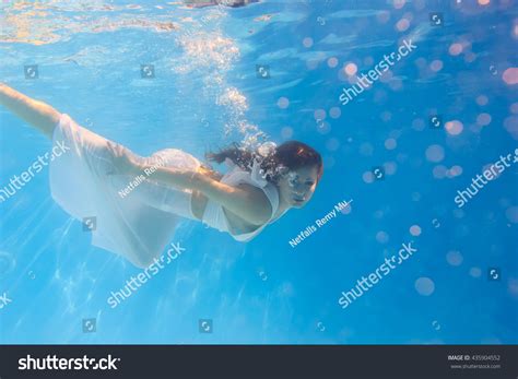 Woman Wearing White Dress Underwater Swimming Stock Photo Edit Now
