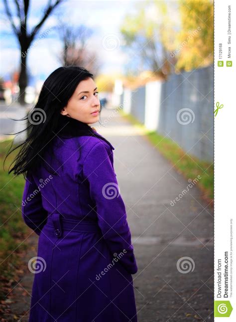 Men's hairlines are often placed further back on the cranium than women. Girl smiling looking back stock photo. Image of female - 17129168