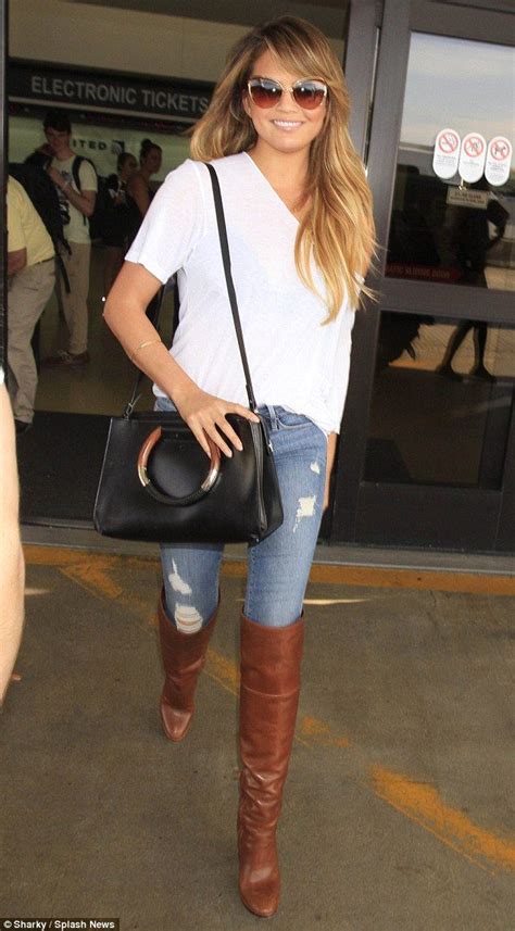 Sticking To What She Knows Chrissy Teigen Glammed Up Her Fail Safe Combination Of Ripped Jeans