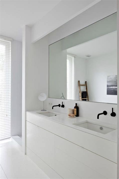 The photograppher, the mirror, or the painter? (pablo picasso) a bathroom isn't choose a mirror with size and shape proportional to the room. Big Bathroom Mirror Trend in Real Interiors