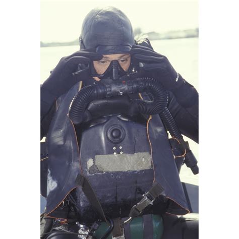 A Navy Seal Combat Swimmer Adjusts His Dive Mask Poster Print 11 X 17