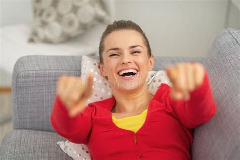 Woman Laying On Couch And Pointing In Camera Stock Image Image Of Indoors Laying 46682495