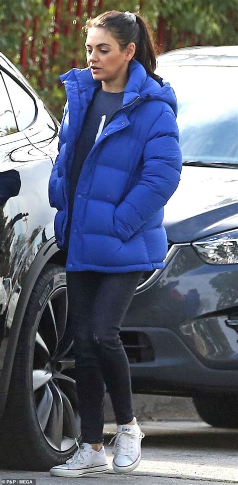 Mila Kunis Works Off Duty Style In Blue Cosy Jacket And White Trainers