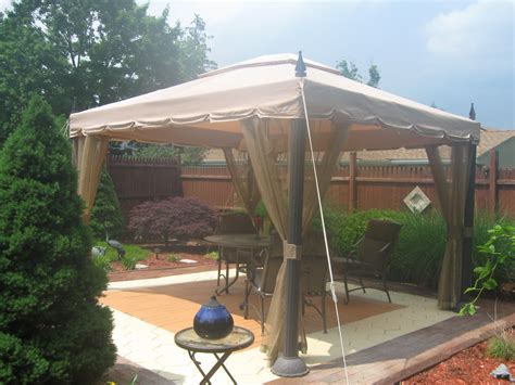 A great way to incorporate an outside living space onto your property is by installing a patio awning or canopy. Pacific Casual 10 ft. x 12 ft. Mediterra Gazebo ...