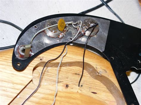 Adding a single tiny jumper wire from the neck tone tab to the. Wiring on a 1975 Fender Precision | TalkBass.com