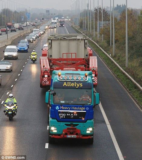 biggest ever load transported on britain s roads weighing more than a space shuttle crawls to