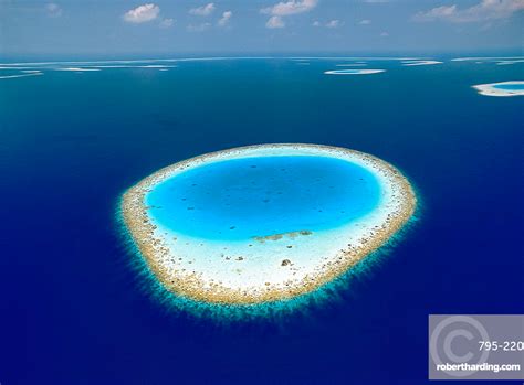 Aerial View Of Atolls And Coral Reefs In The Maldives Indian Ocean
