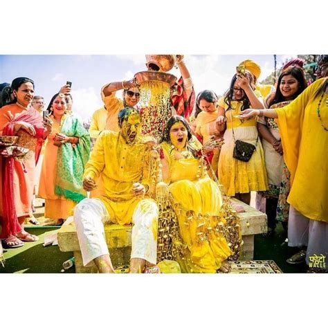haldi ceremony no less than holi groom photoshoot wedding photoshoot poses wedding couple
