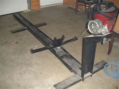 Diy wooden motorcycle lift for under $170. Motorcycle Lift by kenstone -- Homemade motorcycle lift constructed from a commercial lift table ...