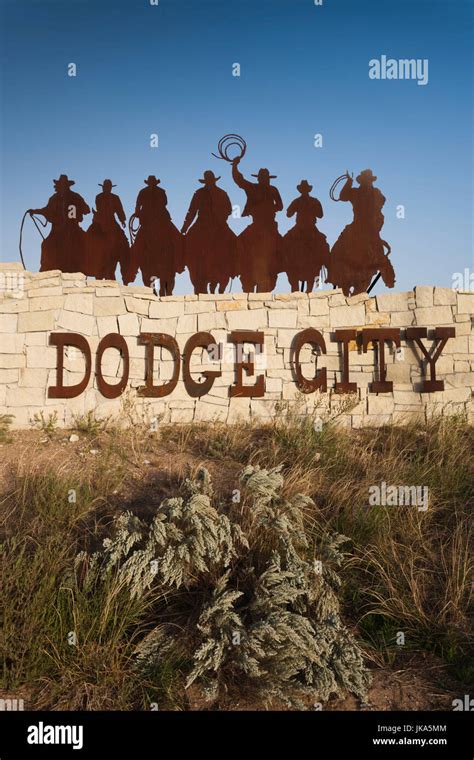Usa Kansas Dodge City City Sign With Cowboy Silhouettes Late