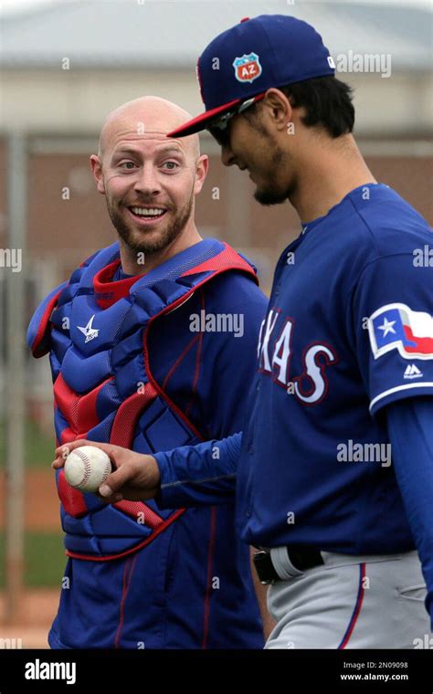 Texas Rangers Pitcher Yu Darvish Right Talks With Catcher Chris Gimenez After A Workout During