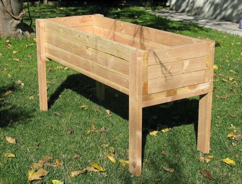 You can build elevated garden boxes and use them throughout your landscaping. Living Green Planters Portable Elevated Planter Box ...