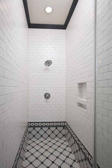 Shower Scape Clean White Brick Jointed Subway Tiles With Black Accent Crown Molding And Black