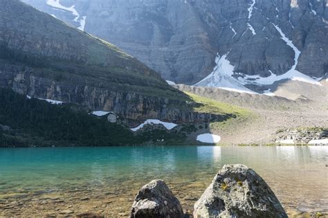 Premium Photo Beautiful Turquoise Alpine Lake Surrounded By