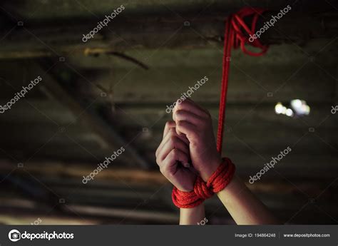 Closeup Hostage Hands Tied By Red Rope Stock Photo Blanscape