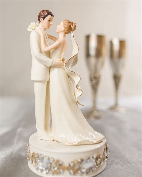 Glam Off White Porcelain Bride And Groom Wedding Cake