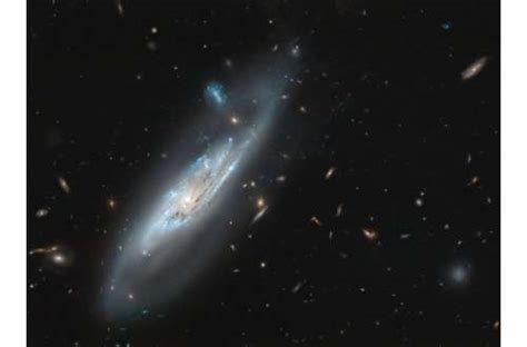Image Hubble Snaps Ghostly Galaxy