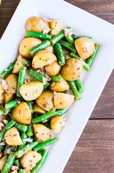 A fancy dish, at first sight, these delicious recipes are so easy to make and doesn't require a lot of money. Green Bean Potato Salad - Delicious Little Bites