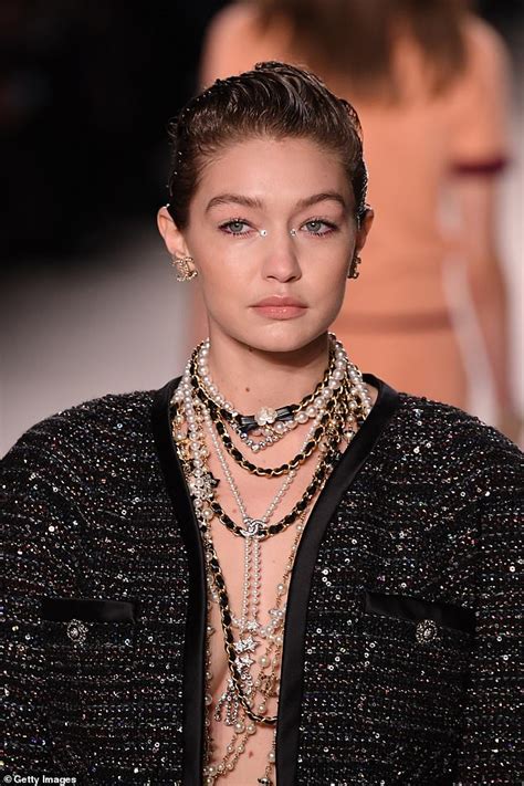 Gigi Hadid Goes Braless In A Glitzy Tweed Co Ord At Chanel S Fashion Show In Paris W