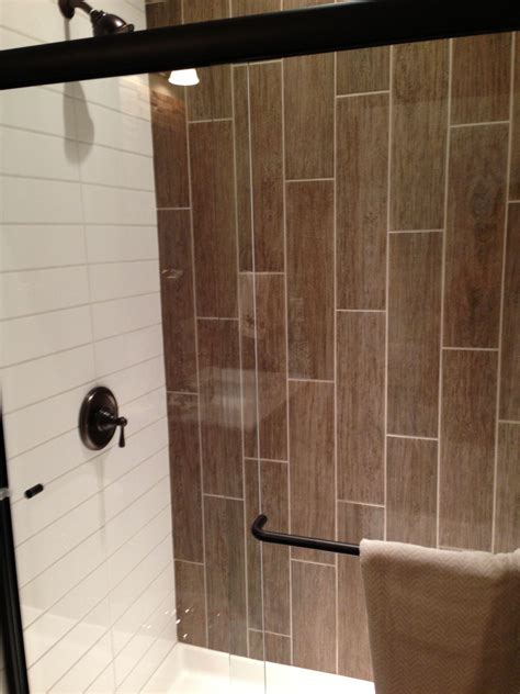 Oftentimes, there are assumptions on how to use certain products within your home renovation. Pin by Dennett Tile on Home Decor | Wood tile bathroom ...