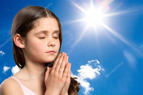 Cute Little Girl Praying — Stock Photo © Billiondigital