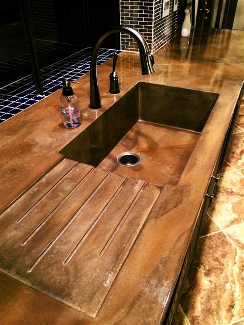 Diy tool from plastic pipe, garage must have idea! Concrete kitchen sink with drain board | Concrete kitchen ...