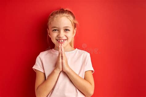 Little Beautiful Child Girl Over Isolated Red Background Begging And