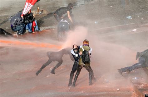 Est Some Photos Riot Police Use Tear Gas And Water Canon To