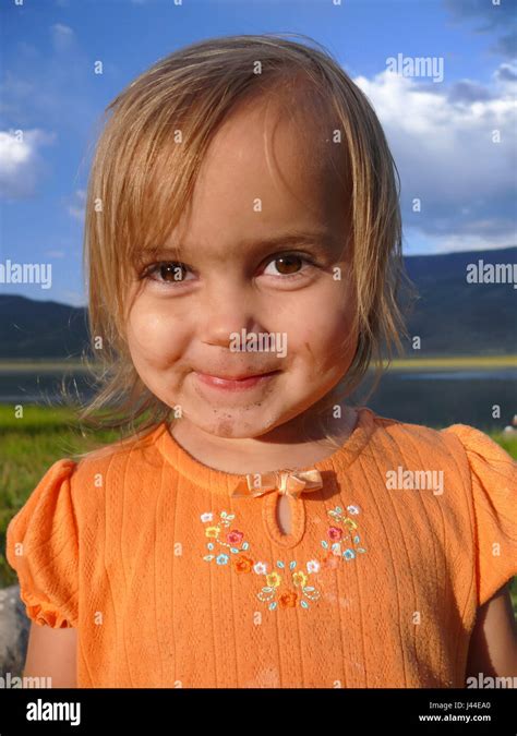 Smiling Girl With A Messy Face Stock Photo Alamy