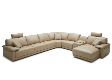 Their shape allows multiple people to stretch out at once, making it cozy to read beside a loved one or even take a joint nap. Modular, L Shape Group Sofa In Leather - Not Just Brown