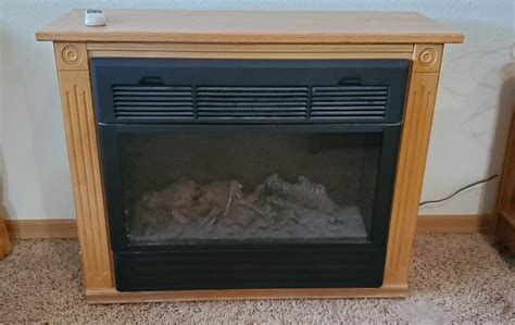 Lot 113 Heat Surge Electric Fireplace With Amish Mantle Model Adl