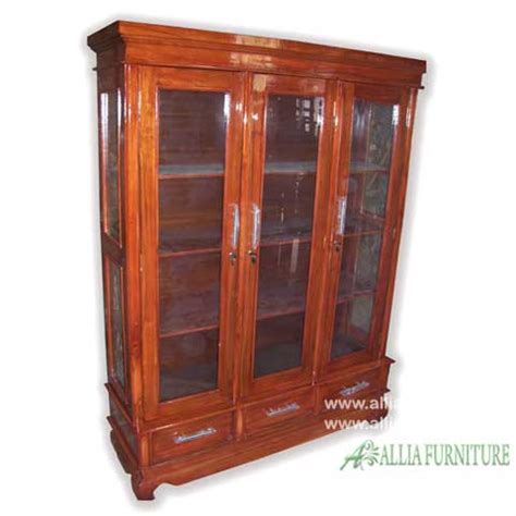Jika anda berminat dengan lemari pakaian 3 pintu minimalis silahkan anda hubungi kontak kami yang sudah tertera pada web. Lemari kaca hias kayu jati 3 pintu laci - Allia Furniture