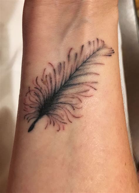 Feather Tattoo On My Wrist Tattoos Leaf Tattoos Feather Tattoo