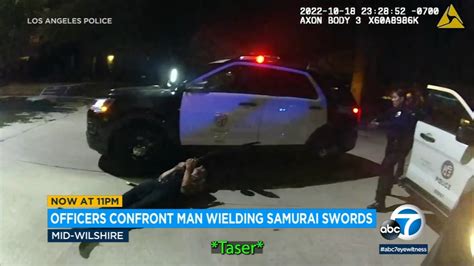 bodycam video shows lapd officers use taser to subdue man wielding samurai swords in mid
