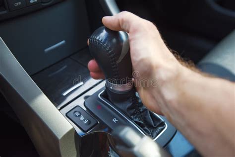 A Man S Hand On An Automatic Gearbox Automatic Shift Transmission