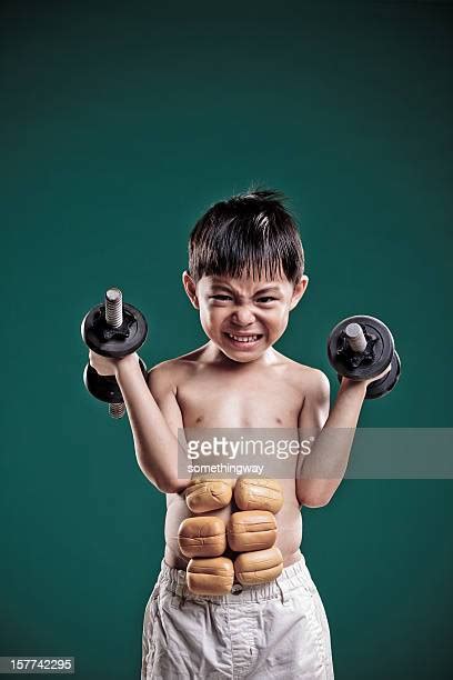 Kids Flexing Muscles Photos Et Images De Collection Getty Images