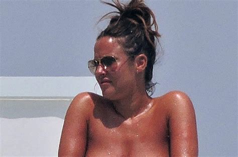 Love Islands Caroline Flack Stuns In Topless Sunbathing