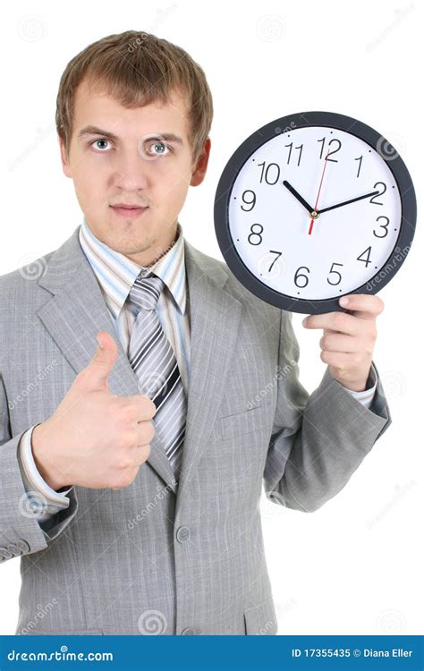Young Businessman Holding A Clock Stock Image Image Of Hour