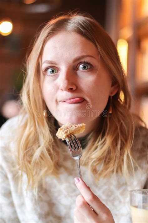 Beautiful Young Woman Eating Homemade Pancakes In Coffee Shop Food