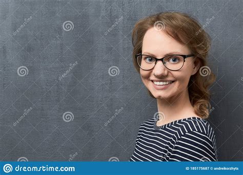 Portrait Of Happy Young Woman With Glasses Smiling Broadly Stock Image