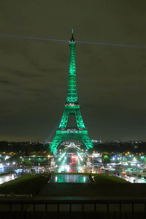 Eiffel Tower In Green Temporarily Lit In Green As A Reminder To The