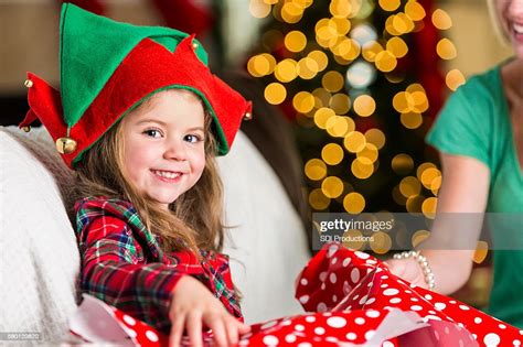 Excited Sweet Girl Opens T On Christmas Morning Photo Getty Images