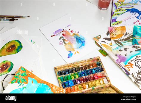 Selective Focus Of Colorful Paints And Watercolor Drawings On White